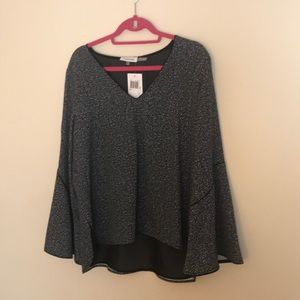 Beautiful Calvin Klein lined blouse with flared sleeve